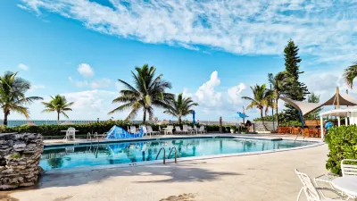 NEW Stunning Beachfront Condo at the Coral Beach