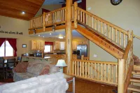 Escape into the countryside. Spacious log home.