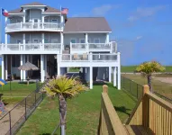 Luxury Beachfront~Ground level Palapas Bar~ Hot Tub ~ private walk over bridge