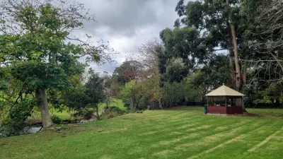 Tranquil retreat on Middleton Road, mid-way between the city and the sea!