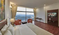 慕那爾拉加馬亞水療度假村 Thommankuthu Falls附近的飯店