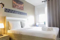 Bright Studio Apartment at Springwood Residence Hoteles en North Panunggangan