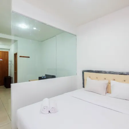 Comfortable and Homey Studio at Titanium Square Apartment Отели рядом с достопримечательностью «Торговый центр Cibubur Junction»