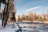 Scenic Patio with River View and Hot Tub - Cozy Mountain Retreat