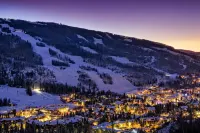 Ski slope-view condo on Gore Creek with fireplace - walk to Vail Village