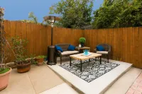 Private Patio and Alfresco Dining Experience - Charming Coastal Retreat
