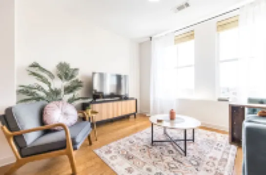 Breathtaking Downtown Views and Designer Amenities - Chic Modern Retreat