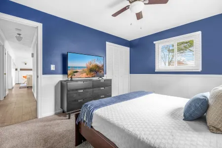 Charming Backyard Oasis with Fire Pit and Rec Room - Inviting Getaway