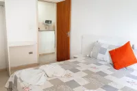 Bella Casa Flat Service Hotels in Bertioga