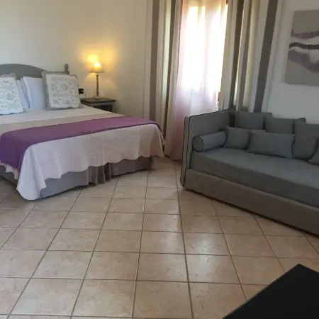 Relais Fenicottero Rosa Отели рядом с достопримечательностью «Пляж Лу-Импосту»