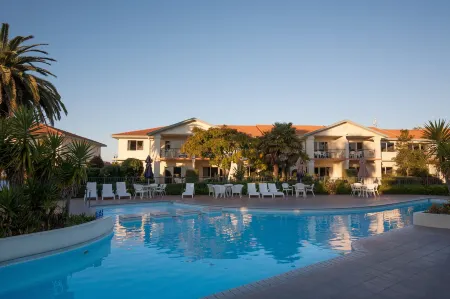 Pacific Palms Resort Отели в г. Папамоа