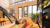 Elegant 2BR Loft Garden Villa at Collins Boulevard Apartment
