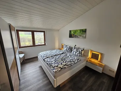 Beautiful vacation apartment on the edge of the forest with three bedrooms. Hotels near Freibad Bad Koenig