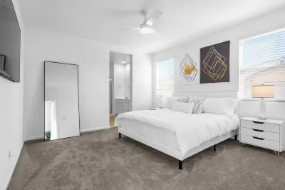 NEW 2024 HOME 3BR/2BA, 2 CAR GARAGE, LEVEL 2 EV CHARGER, 86" TV, AND  KING BED Hotels near Goodyear Ballpark