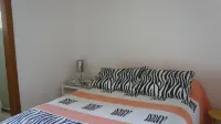 Charming 3/4 apartment with private backyard overlooking the Imbassai Sea