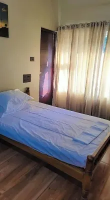 Cozy Glass Villa home. Five minutes walk to the happening Varkala cliff Hotels in Varkala Beach
