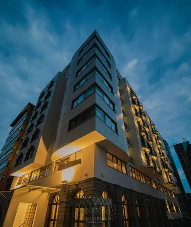 The Grand Palace Hotel Отели рядом с достопримечательностью «AU Conference Center»