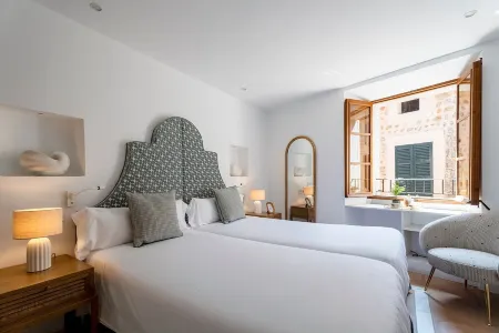 Petit Biniaraix Ex-Menditzu Rooms Отели в г. Сольер