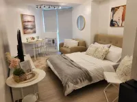 Minimalist Condo in Azure North Hotels near Don Honorio Ventura State University - Mexico Campus