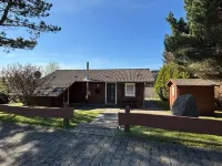 Log cabin in the heath village