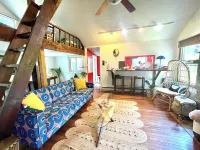 Cozy cabin with deck and fireplace steps from White Pond Lake. Dog friendly.
