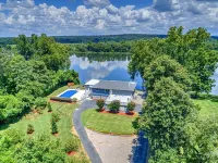 Waterfront Oasis: Relax by the Pool, Fish, Kayak, and Enjoy Fire Pit Gatherings!