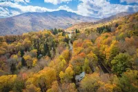 Location! Charming mountain retreat at 4000' elevation with stunning views.