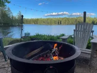 Cozy Adirondack cabin with private dock and kayaks, feet from Adirondack Lake