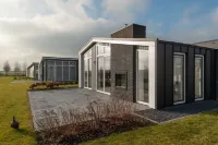 Chalet with Fireplace near Oosterschelde
