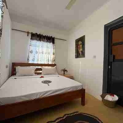 Cozy 3-Bedroom Home – 2 Minutes from Jambiani Beach Rooms