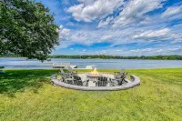 Lakefront Retreat With a Large Yard, Stone Fire Pit, Gazebo, Deck, & Dock - 4-Star