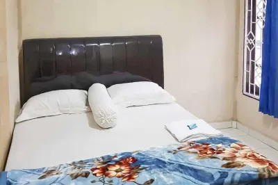 Airangga Home Stay Syariah Berastagi Mitra RedDoorz Hotel dekat Pajak Sayur Mayur Roga Berastagi