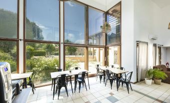 Appart'Hotel Garden & City - Marcy L'Etoile - Housity