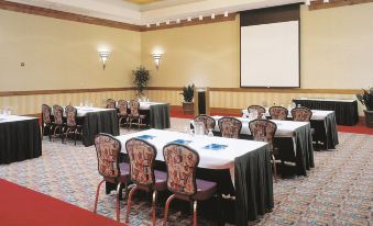 a large conference room with multiple rows of tables and chairs arranged for a meeting at Harrah's Ak-Chin Casino Resort