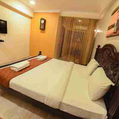 Hotel Udupi International Rooms