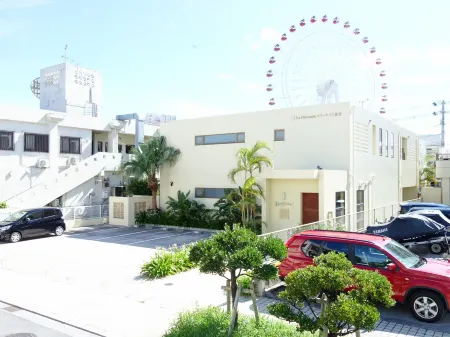 Sunline Chatan Condominium Resort Отели рядом с достопримечательностью «Американская деревня»