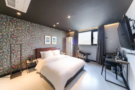 Busan Myeongji Brown Dot Отели рядом с достопримечательностью «Yishu Island Migratory Park»