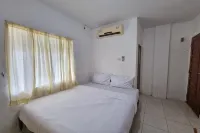 OYO 93493 Wira Residensia Syariah Hotels near House of Representatives Building of Binjai City