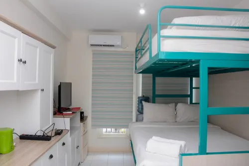 Comfort Studio Apartment for 4 Pax at Podomoro Golf View By Travelio