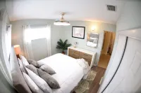 Unique waterfront home, Hot Tub, private boat dock,  walk to beach, pet friendly