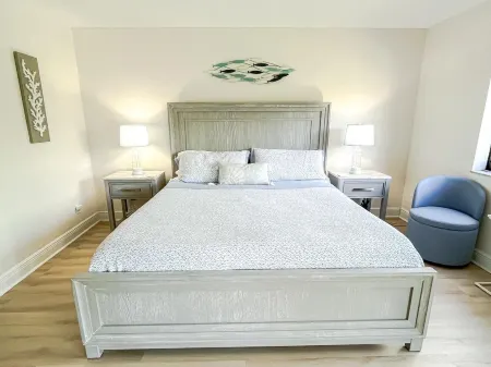 Coastal condo with patio, steps away from the beach in exclusive gated community