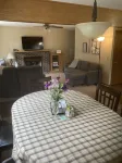 Roomy home with spacious fenced in backyard and fire pit.