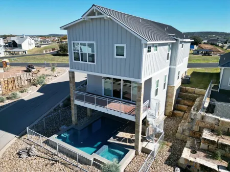 Shenanigans New Large  home steps from the water. Heated Pool hot tub boat slip