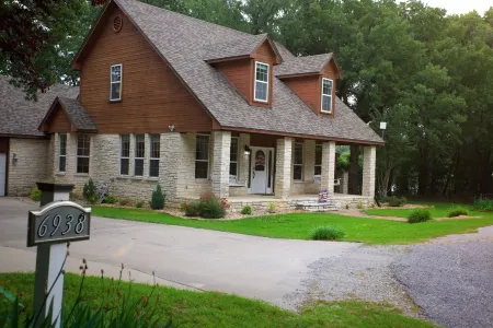 Tranquil Texoma Lake House w/ private lake on .5 acres & steps from Lake Texoma