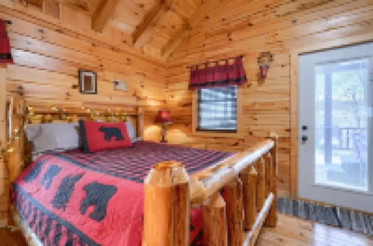 Bear Hugs cabin nestled in the woods.