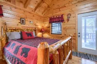 Bear Hugs cabin nestled in the woods.