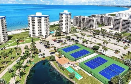 Beachfront Condo Located on 10 Acres of Pristine Beach. Estero Beach Tennis B208