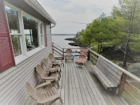 Enjoy the stunning views while relaxing on the deck at East Ledge Cottage