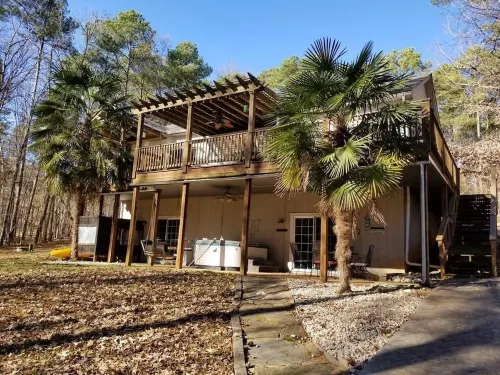 Relax among the palms at Reeled Inn on Beautiful Lake Gaston