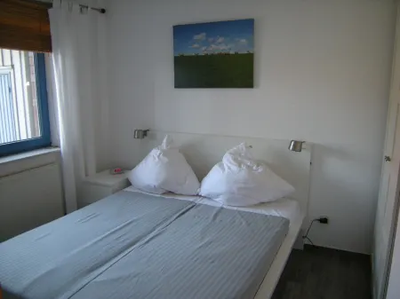 Modern apartment for 2 people directly on the beach - free WiFi